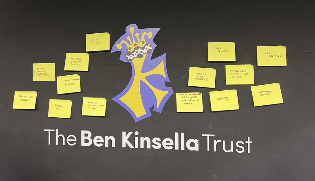 Make (Good) Trouble's workshop wall at Ben Kinsella Trust with post-its showing participant's goals for media training workshop including 'clarity', 'stage fright' and 'speaking under pressure'.