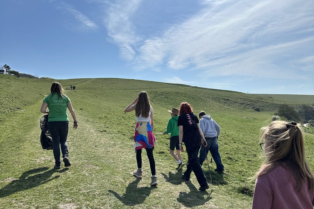 young people walking through the South Downs National Park
