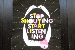 Stop shouting start listening banner