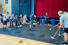 Young-people-stomping-with-brooms-copy